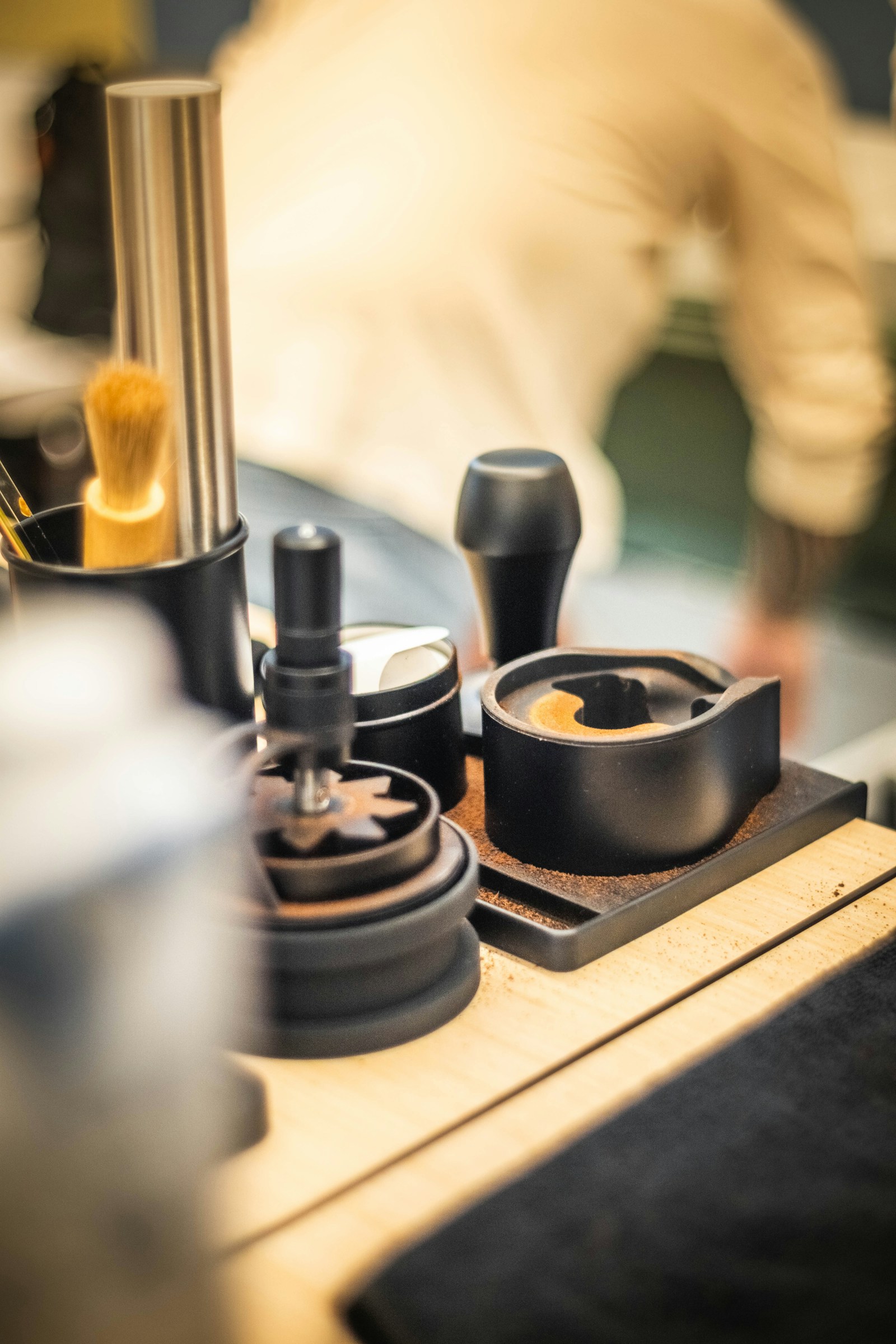 Barista tools on a wooden counter