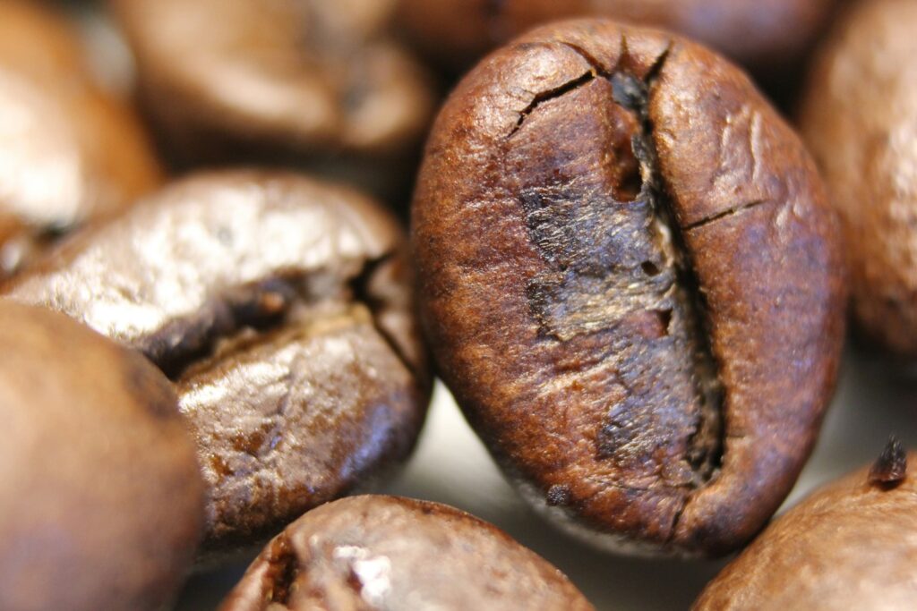 Roasted coffee beans spread on a table